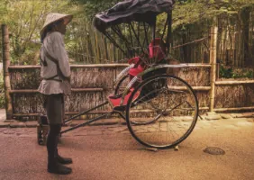 man infront black red carriage